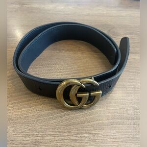 Belt with gold buckle